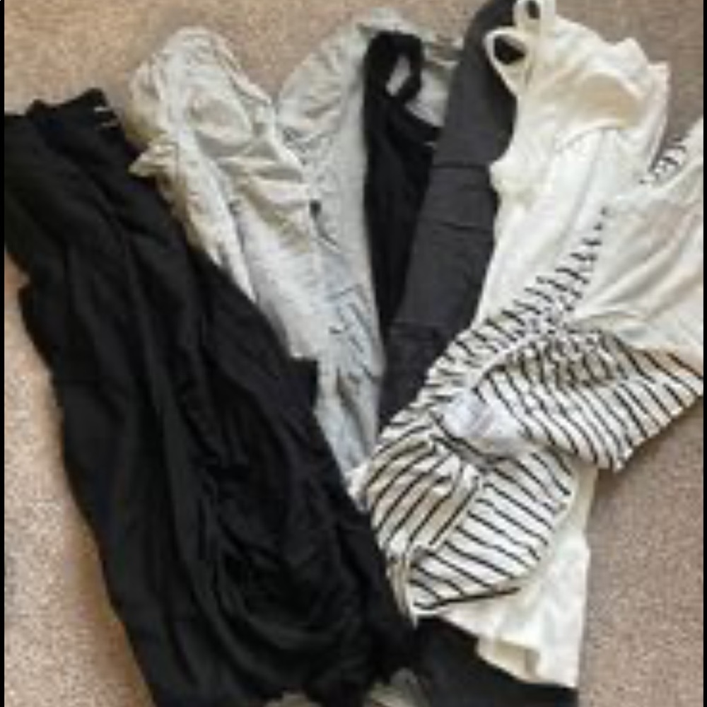 9 maternity tops- a mix of black, grey and white. Various sleeve lengths